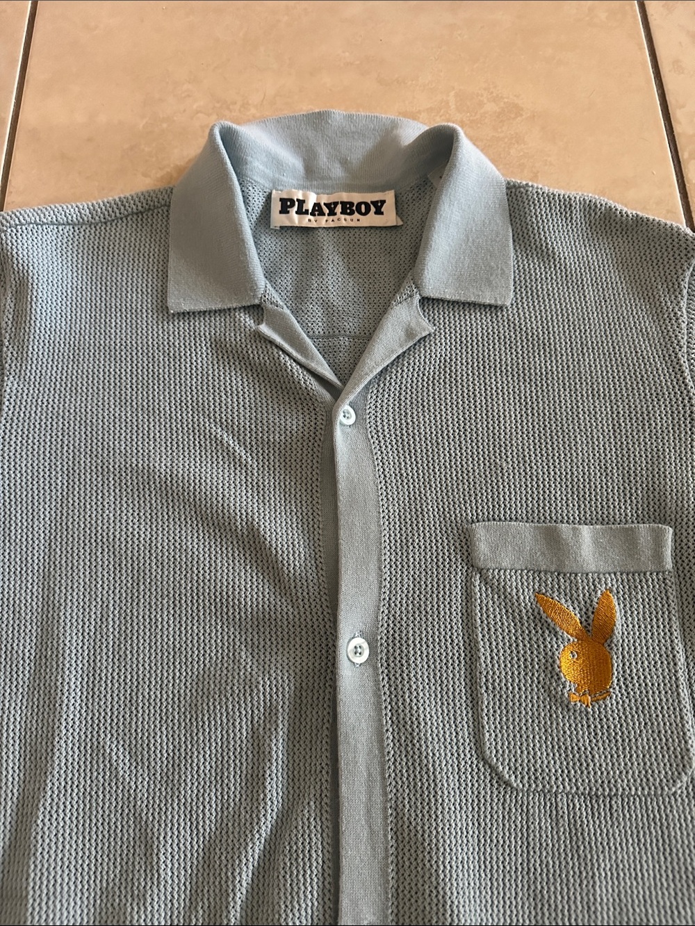 PLAYBOY Light Blue Button-Down Knit Shirt with Gold Bunny Patch